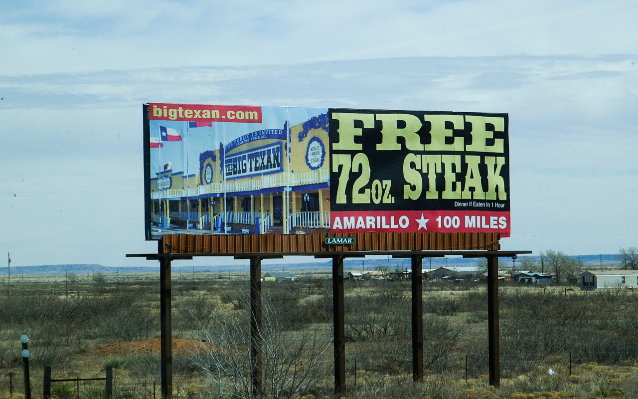 The first clues that you are approaching Amarillo, TX are the hundreds of signs along the  highways calling you to a free steak dinner. Yes, there are just a few strings attached.