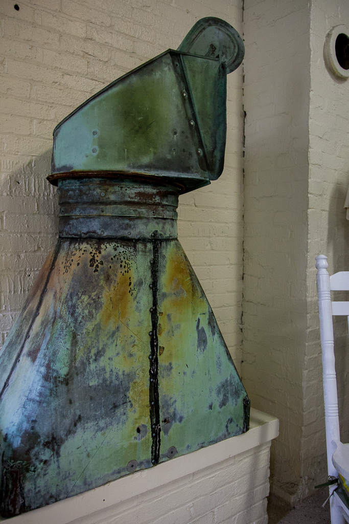 Chimmy with wind vane to keep the smoke out of the house