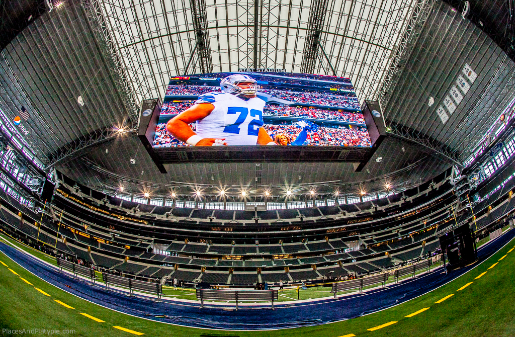 View of the giant television screen from behind the bench