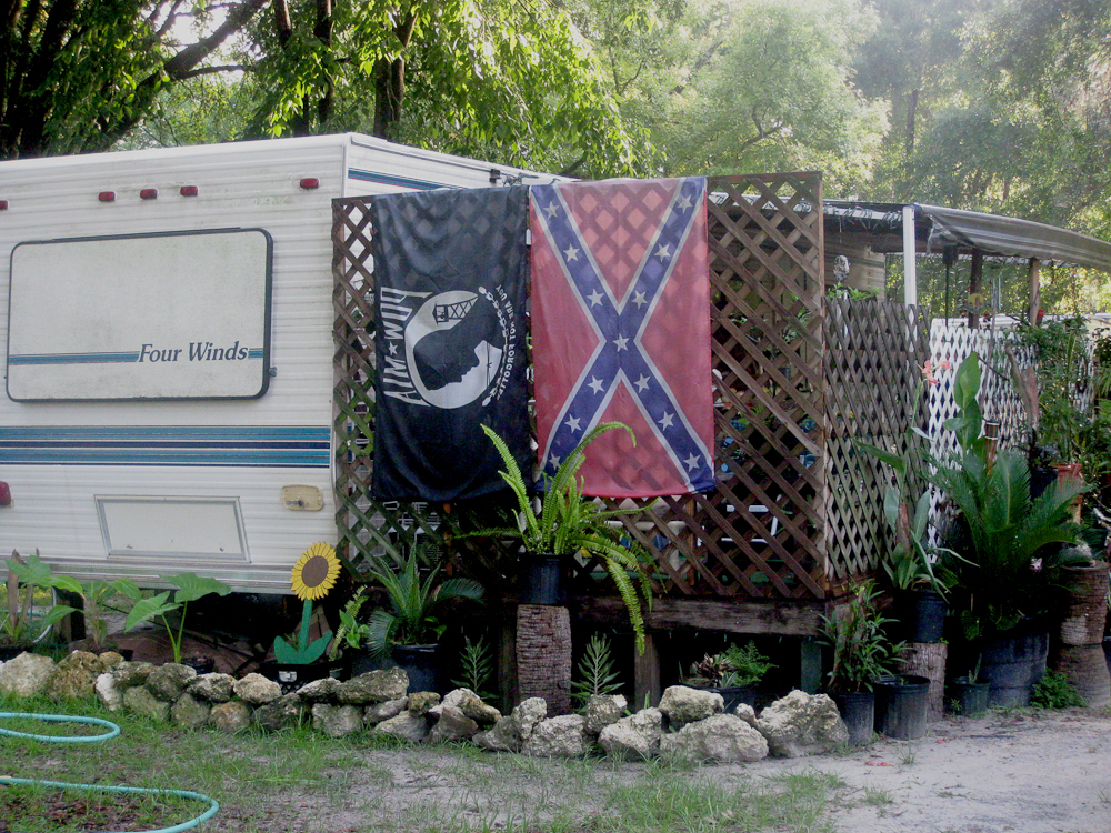 In the south, the Confederate flag gives a real call from  history as well as a sense of place. Sometimes the flags are accompanied by large bumper stickers that say things like, 