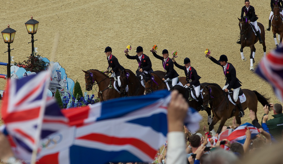 GB's team circles the ring to the cheeers and flag waving of the crowd.