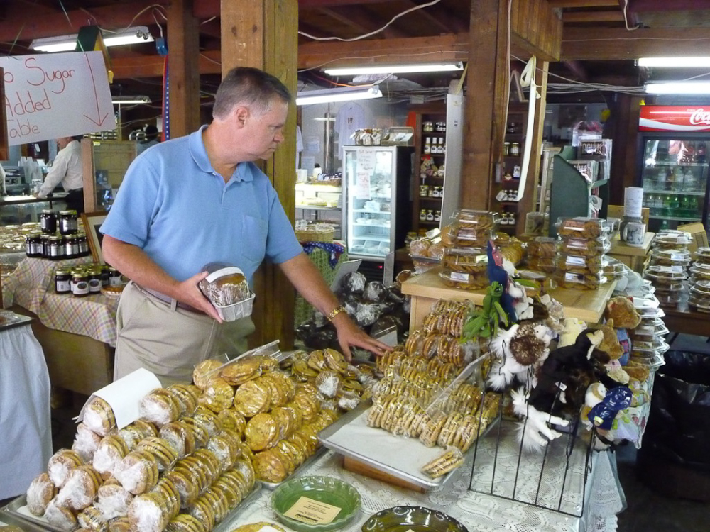 At the Apple Pie Bakery...Jon is picking out a chocolate peanut butter whipped cream pie for 3.