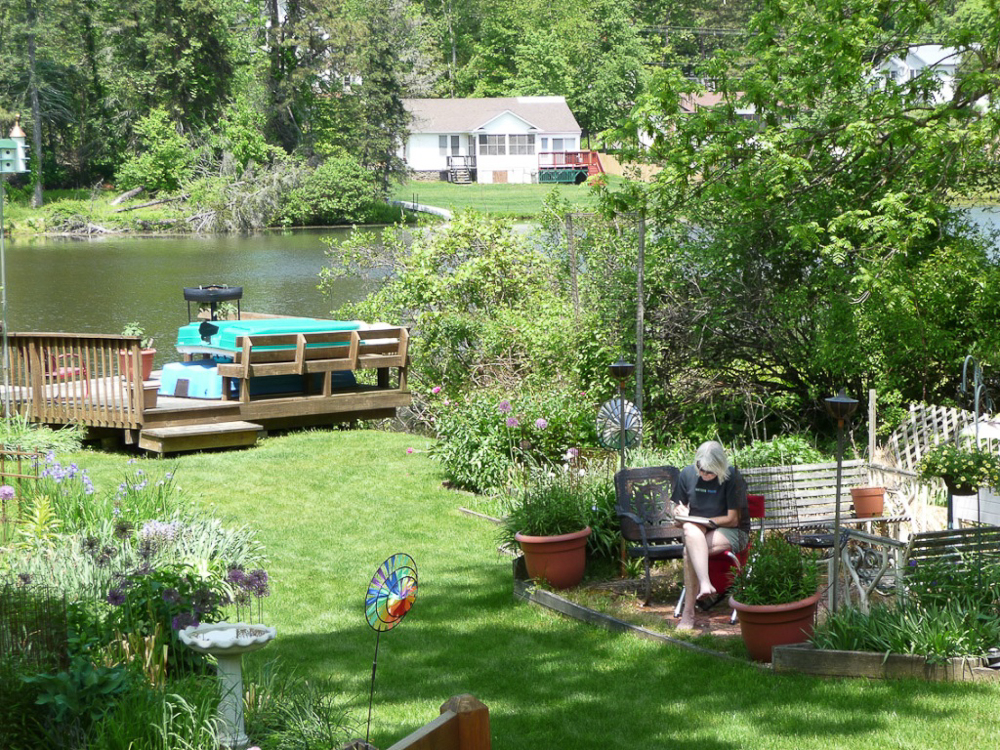 Me, at my usual pastime, drawing in the garden.