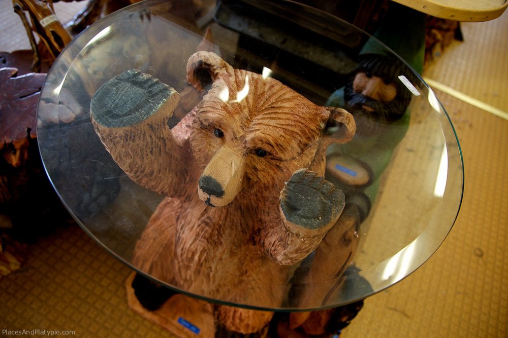 No family room is complete without a chainsaw bear occasional table.