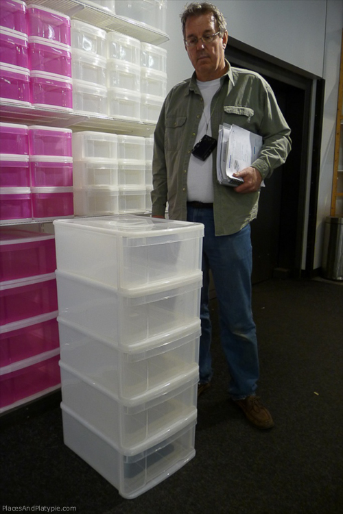 Selecting the drawers to go under the worktable at The Container Store.