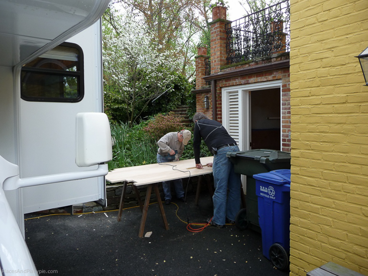 Cutting the pieces of the raised floor.