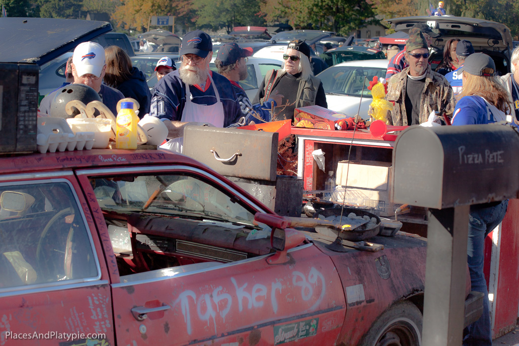 Kenny explains the fine points of real tailgating to Peg