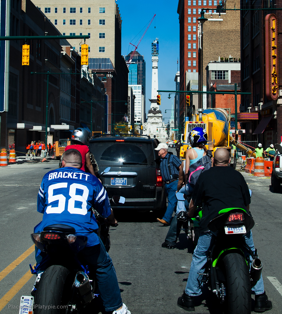 Fans dodging construction near the downtown stadium. The central monuments (straight ahead) are being worked on too.
