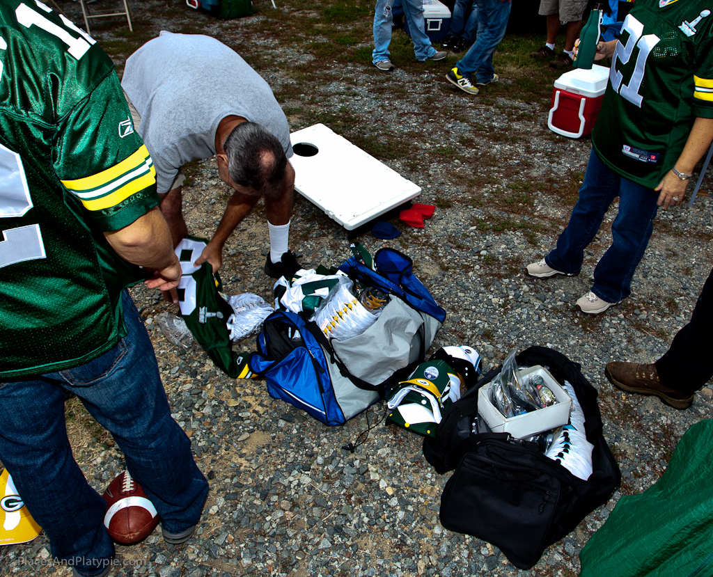 This Packers tailgate group brought enough new hats and jerseys for the whole clan to be decked out in green - wow!