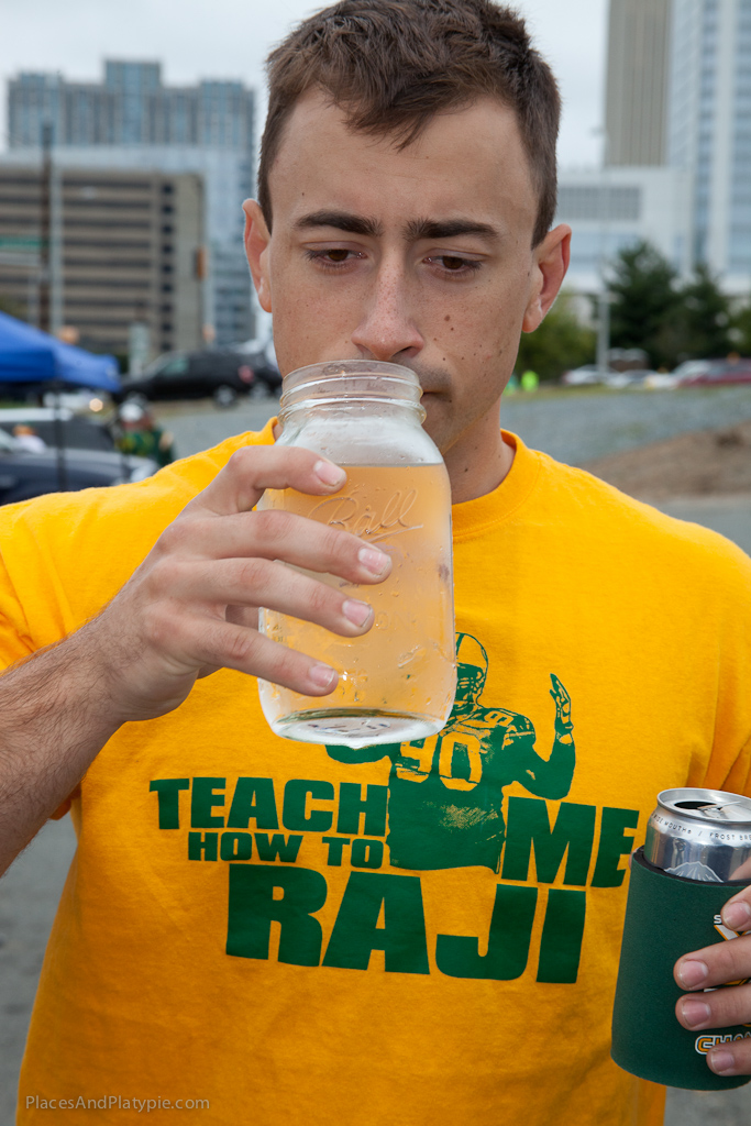 Packer fan meets two-fisted Carolina drink - POW!