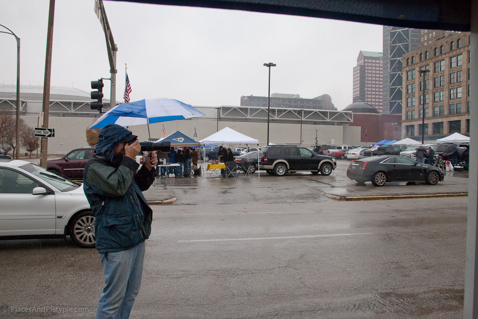 The gameday AFTER shot of Robert's parking lot - sparse but hardy!  A true tailgating photographer carries a big lens - and a little umbrella!